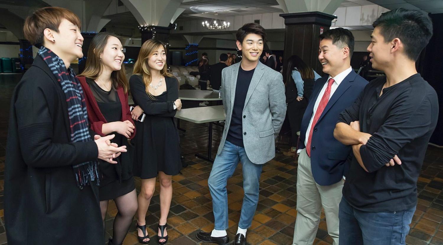 Eric Nam with Korean Students Association co-presidents Yerim Jee '17 of the Morrissey College of Arts and Sciences and classmate Margaret Chang of the Lynch School of Education, and Carroll School of Management junior Hyunsoo Jason Kim, president of KISO, the Korean International Students Organization.