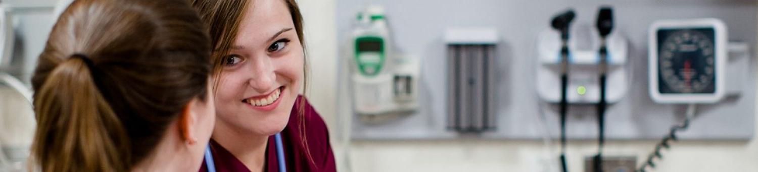 Students talking in a doctor's office