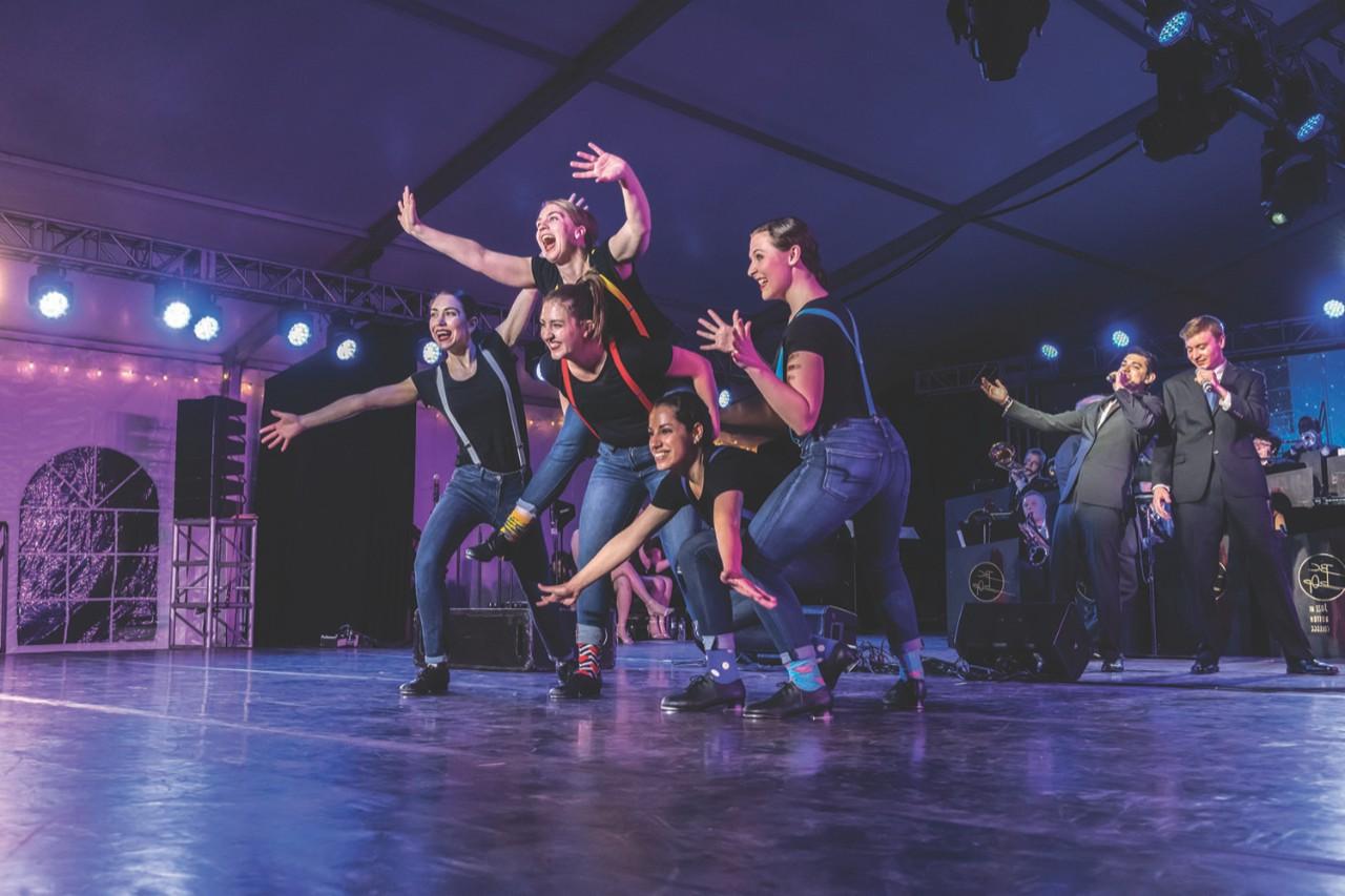 Coverage of Sam Biondollilo at the lighting table for the Dancing With bOp performance, and coverage of On Tap performing with bOp. Photographed for the Spring 2018 issue of BCM. On Tap performing with BC bOp. 在这里, On Tap performers L-R: Julia Nicholson, Michaela Simoneau, Amanda Sackmaster (base of piggyback), Jenie Rowland (on top of Amanda), and Emma Yates.