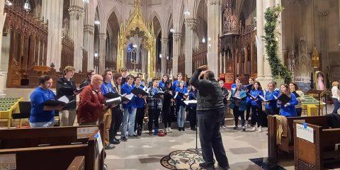 choral group at rehearsal in a church